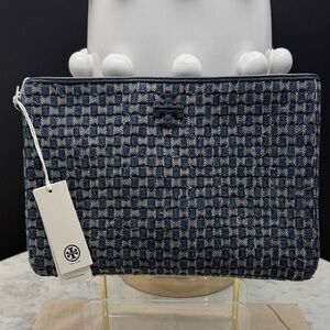 Tory Burch Blue Woven clutch.